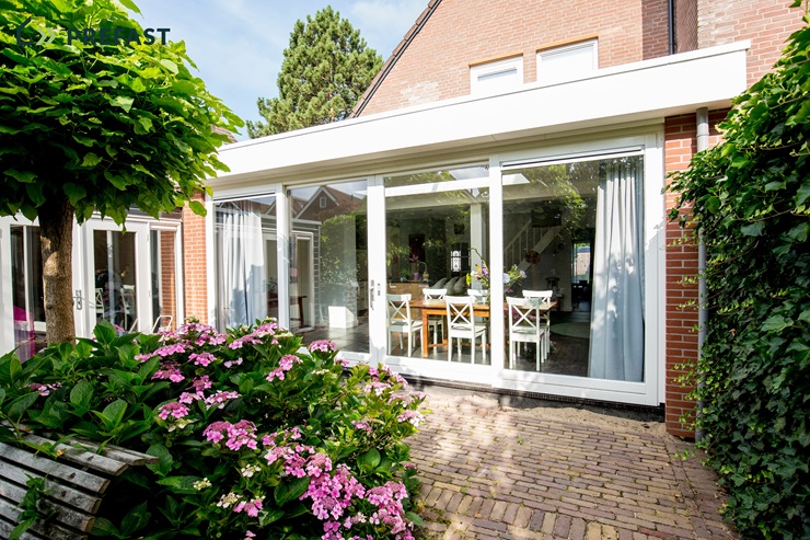 Uitbouw in Huizen
