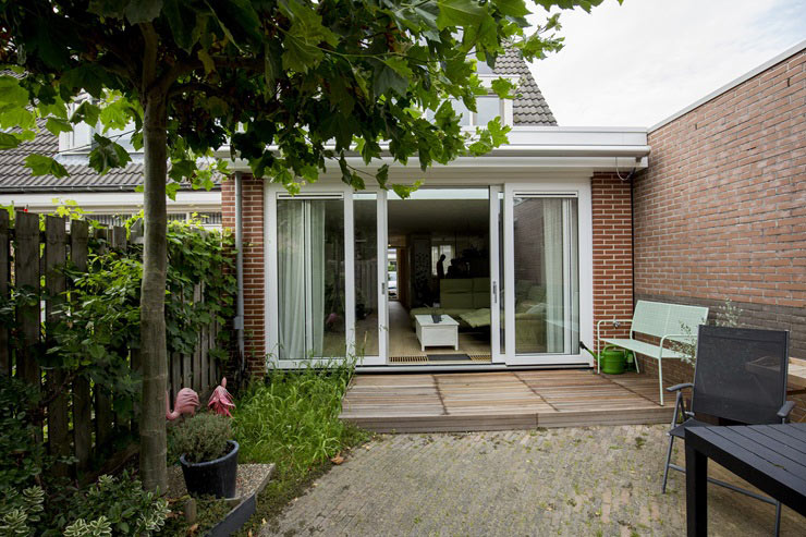 uitbouwen jaren 30 woning met schuifpui